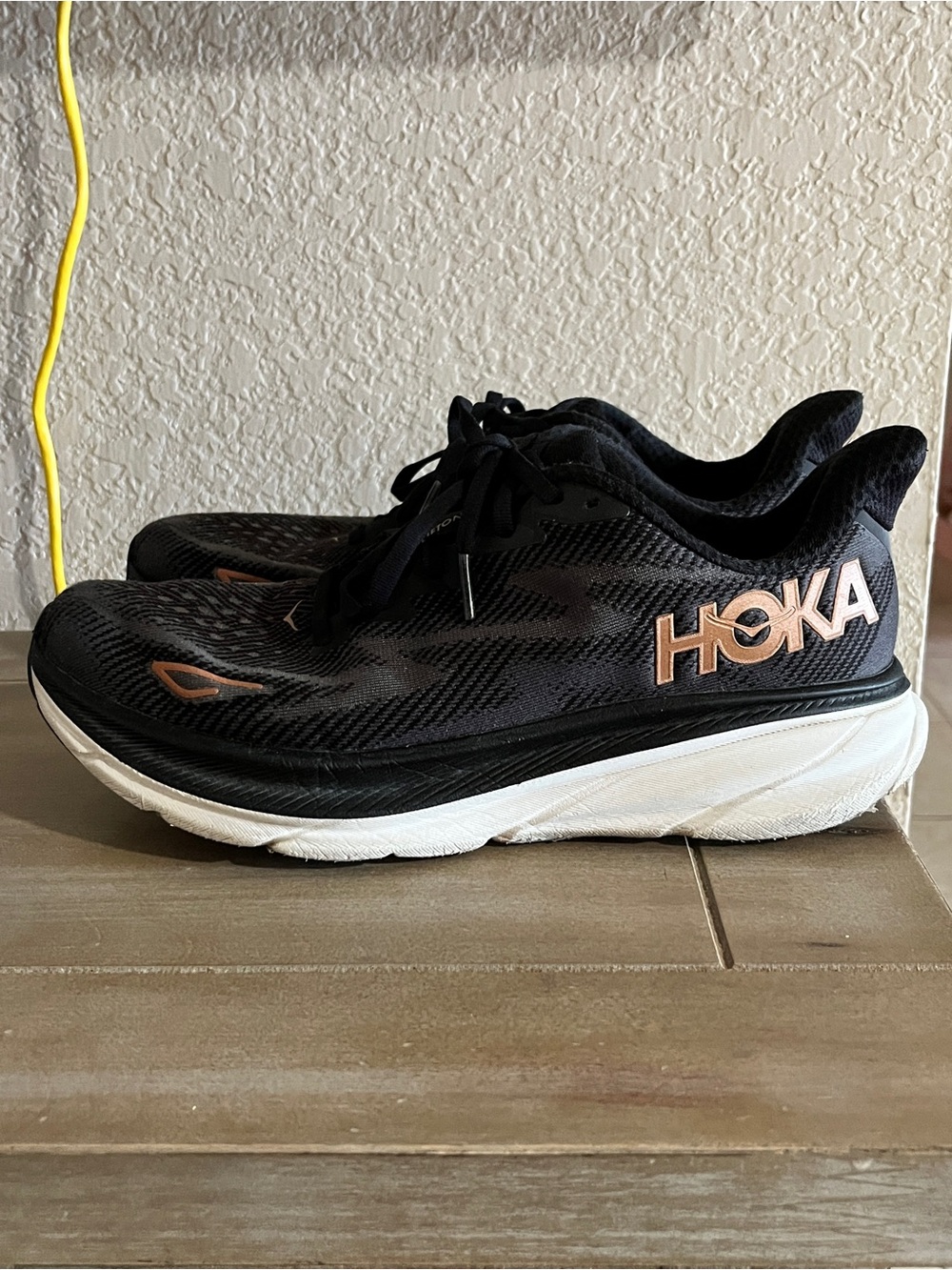 Hoka Black and Rose Gold Clifton 9 Running Shoes